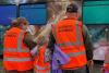 Community volunteers in hi viz tabards