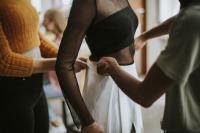 A costume being fitted to a model
