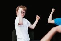 Young disabled children taking part in a drama group