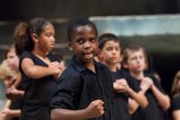 Children performing as part of the RSC’s Regional Schools Celebration