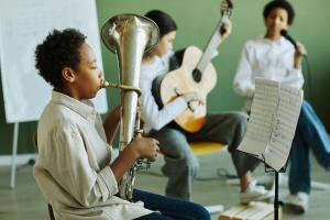 Schoolchildren playing musical instruments