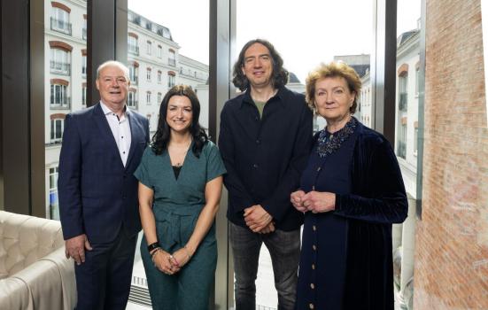 Arts Council Northern Ireland's Liam Hannaway, Karly Greene, and Roisin McDonough, along with musician Gary Lightbody (second from right)