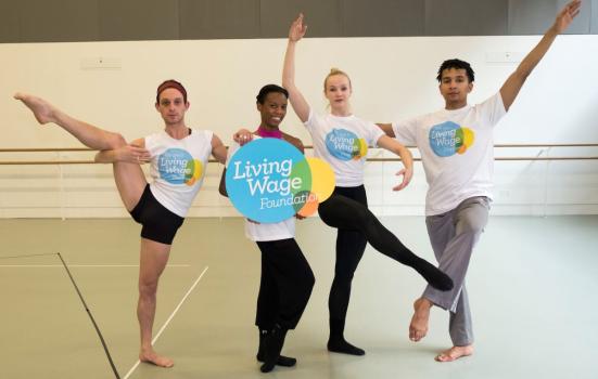 Image of dancers with real Living Wage banner