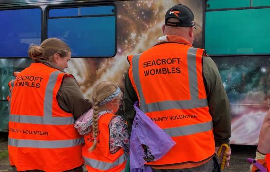 Community volunteers in hi viz tabards