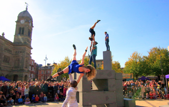 Performers and spectators at Derby Feste in 2018