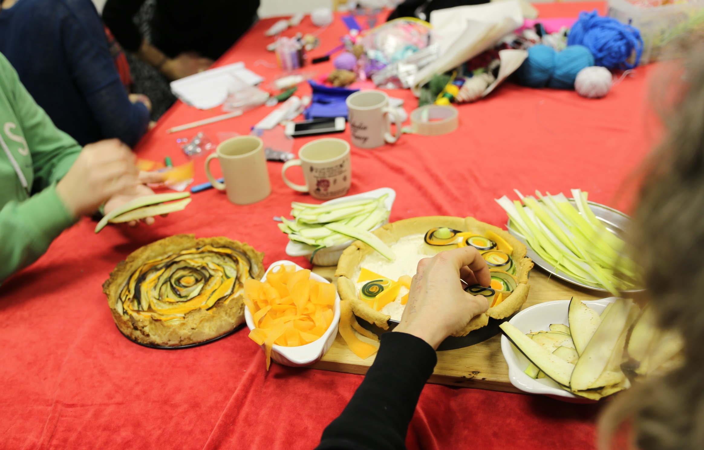 Photo of people making a tart