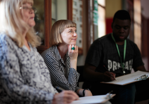 Collette Griffin sits in a meeting