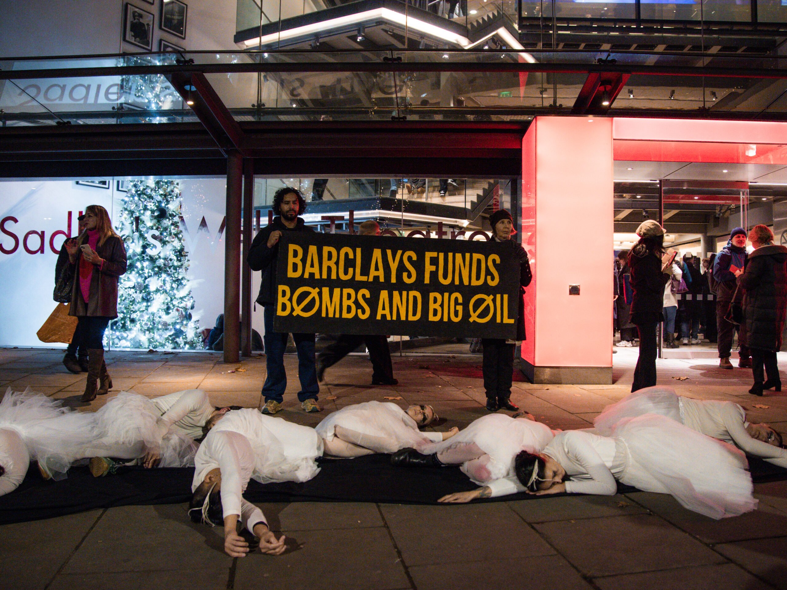 Protesters outside Sadler's Wells with banner